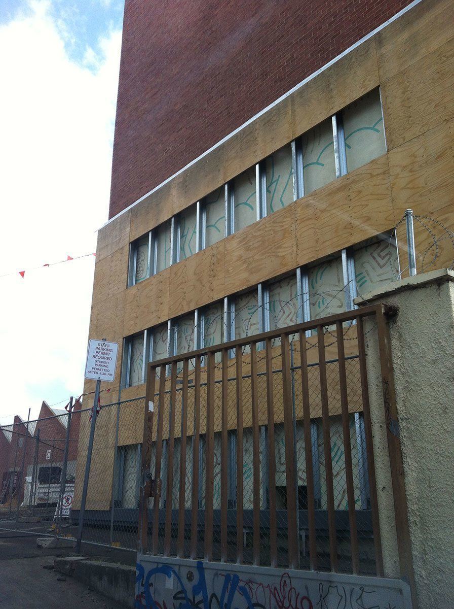 The mural currently covered up for protection while development work begins onsite, September 2012